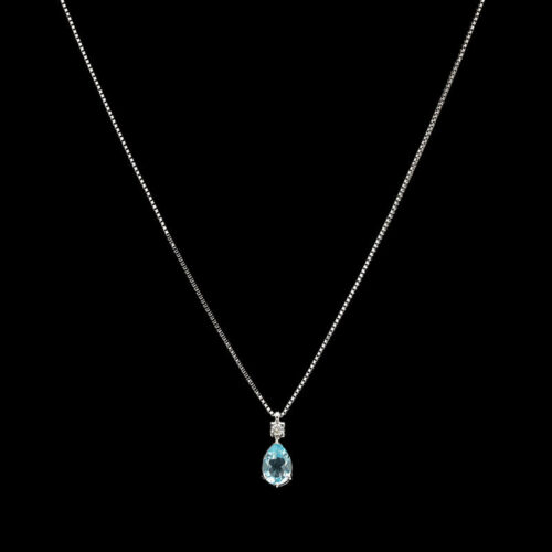 a necklace with a tear shaped blue stone