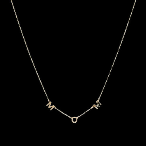 a gold necklace with the word mom on it