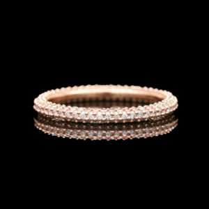 a rose gold and white diamond band