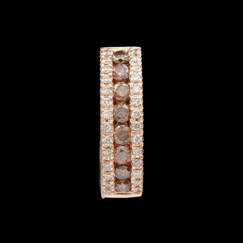 a ring with brown and white diamonds