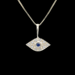 an evil eye necklace with diamonds and sapphires
