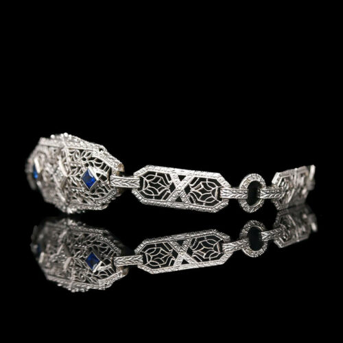 a pair of bracelets with blue stones