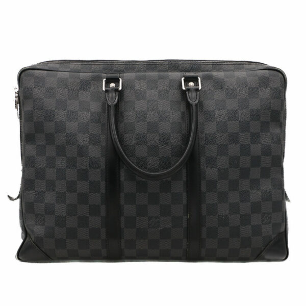 a black and grey checkered bag with handles