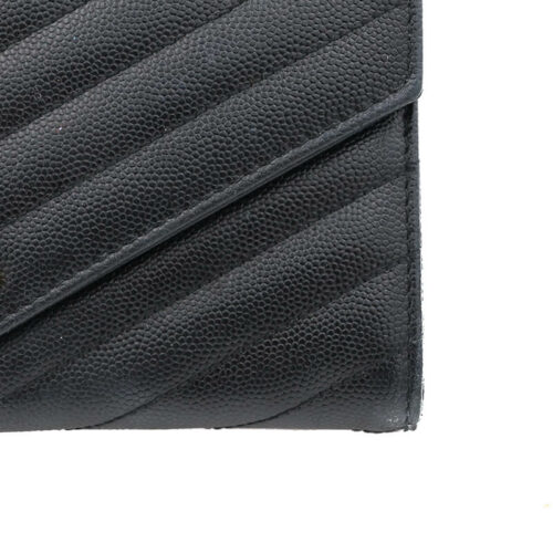 a black wallet with a gold logo on it