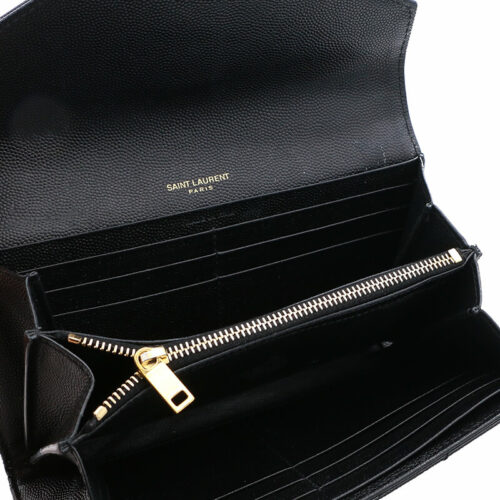 a black purse with a zipper on the inside