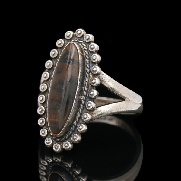 a silver ring with a stone in the middle