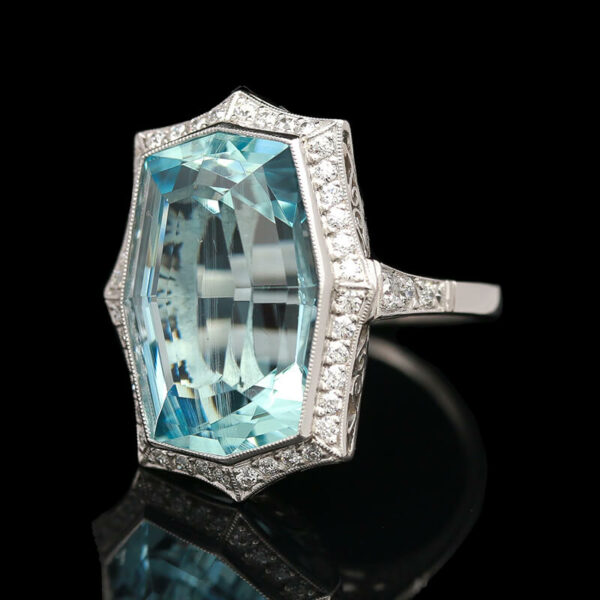 an aqua blue topazte and diamond ring