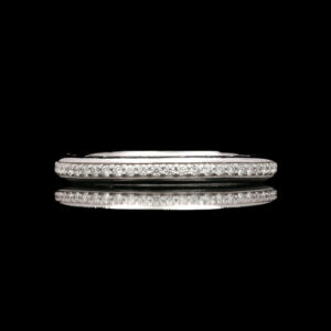 a diamond set wedding ring in white gold