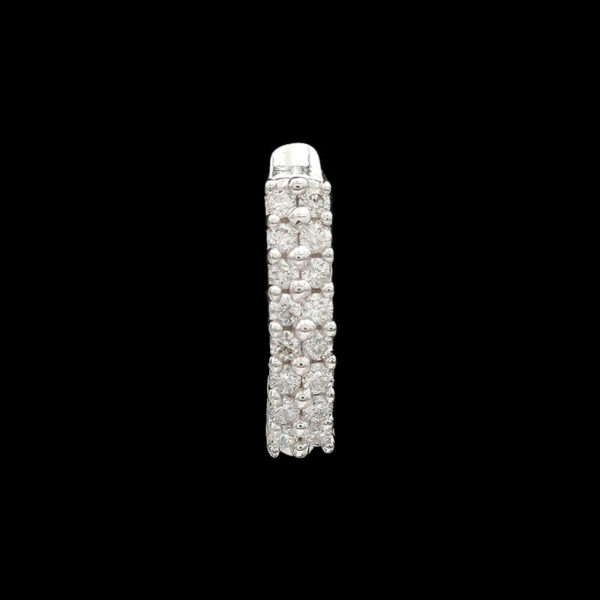 a white gold and diamond brooch