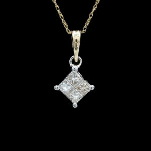 a diamond pendant is shown on a black background