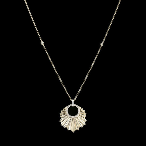 a necklace with a circular design on it