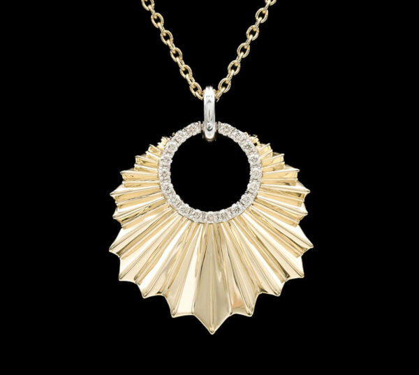 a gold and diamond necklace with a circular design