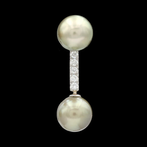 a pearl and diamond pendant
