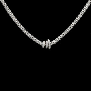 a silver chain with two rings hanging from it