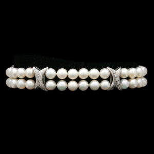 three strand pearl bracelet with diamond clasp