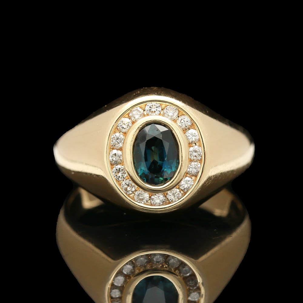 008-000578_0ymvEYIAY 14k yellow gold sapphire & diamond halo ring