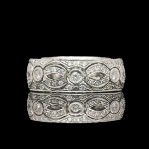 hand carved platinum diamond milgrain edge band with engraved sides
