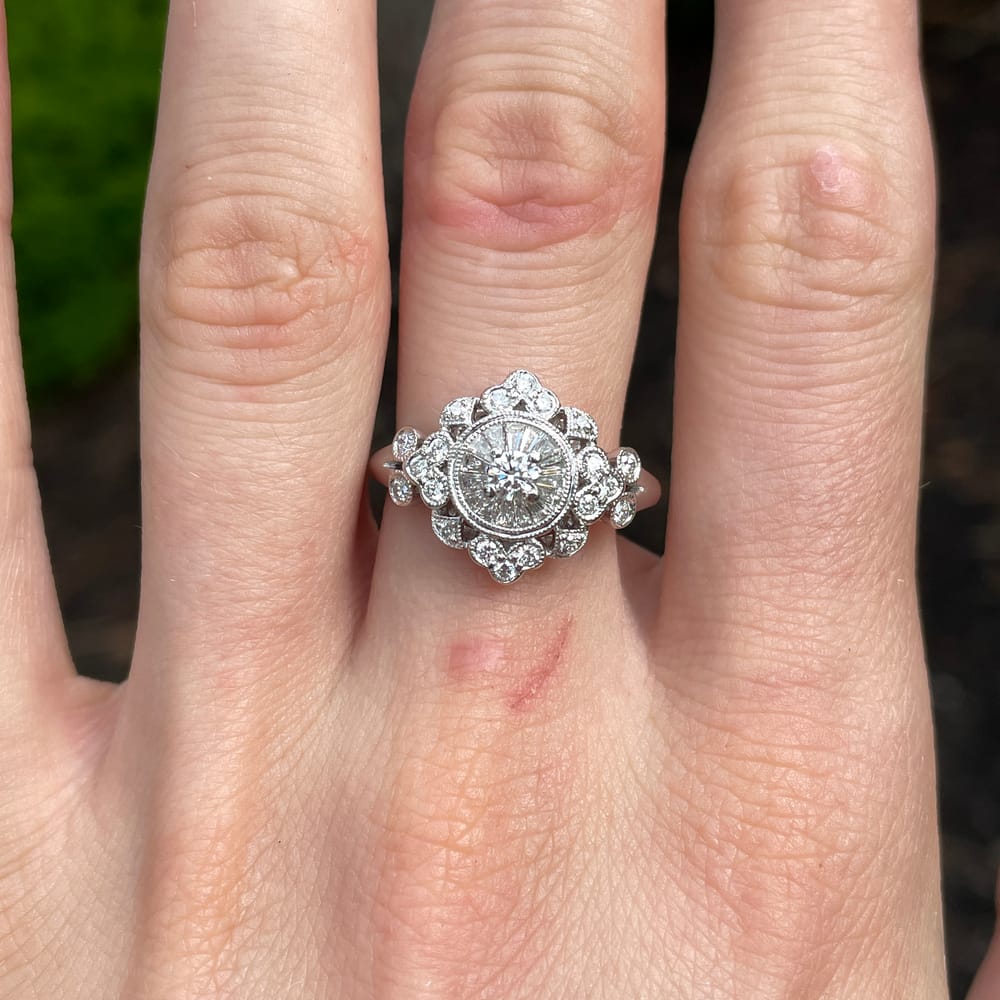 007-001770_1AOOvnIAH 18k white gold diamond halo filigree style ring with invisible set baguettes