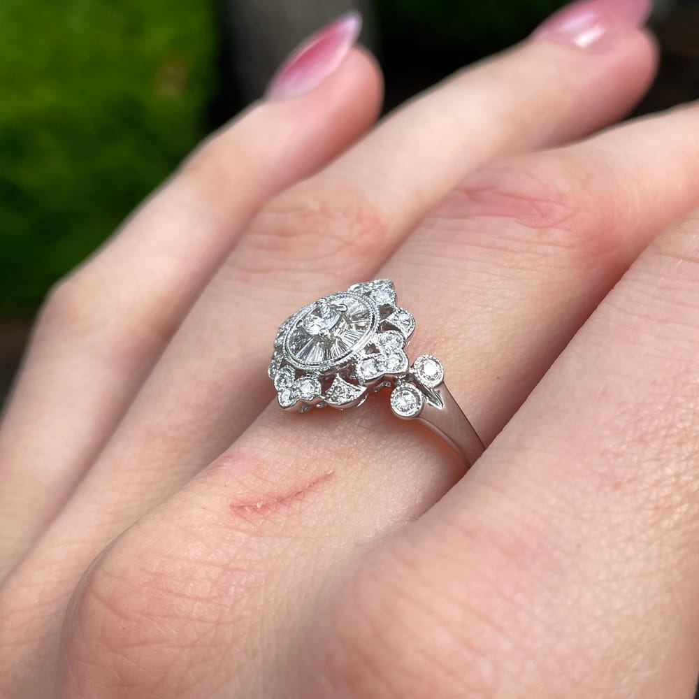 007-001770_1APCpJIAX 18k white gold diamond halo filigree style ring with invisible set baguettes