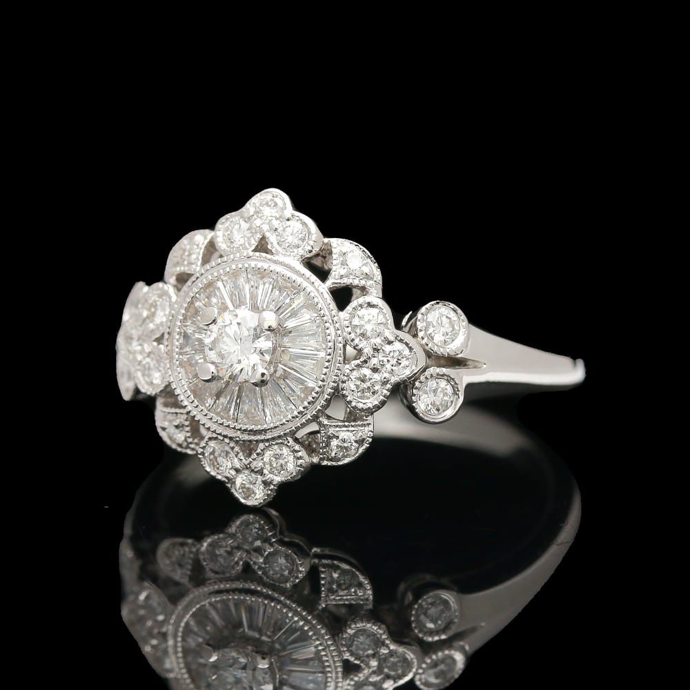 007-001770_1CB0RvIAL 18k white gold diamond halo filigree style ring with invisible set baguettes