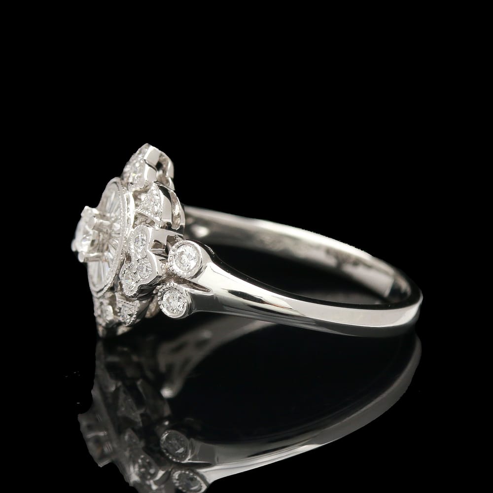 007-001770_1CB62fIAD 18k white gold diamond halo filigree style ring with invisible set baguettes