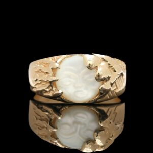 Shube's Mfg. 10k Yellow Gold Carved Man in the Moonstone Cabochon Ring