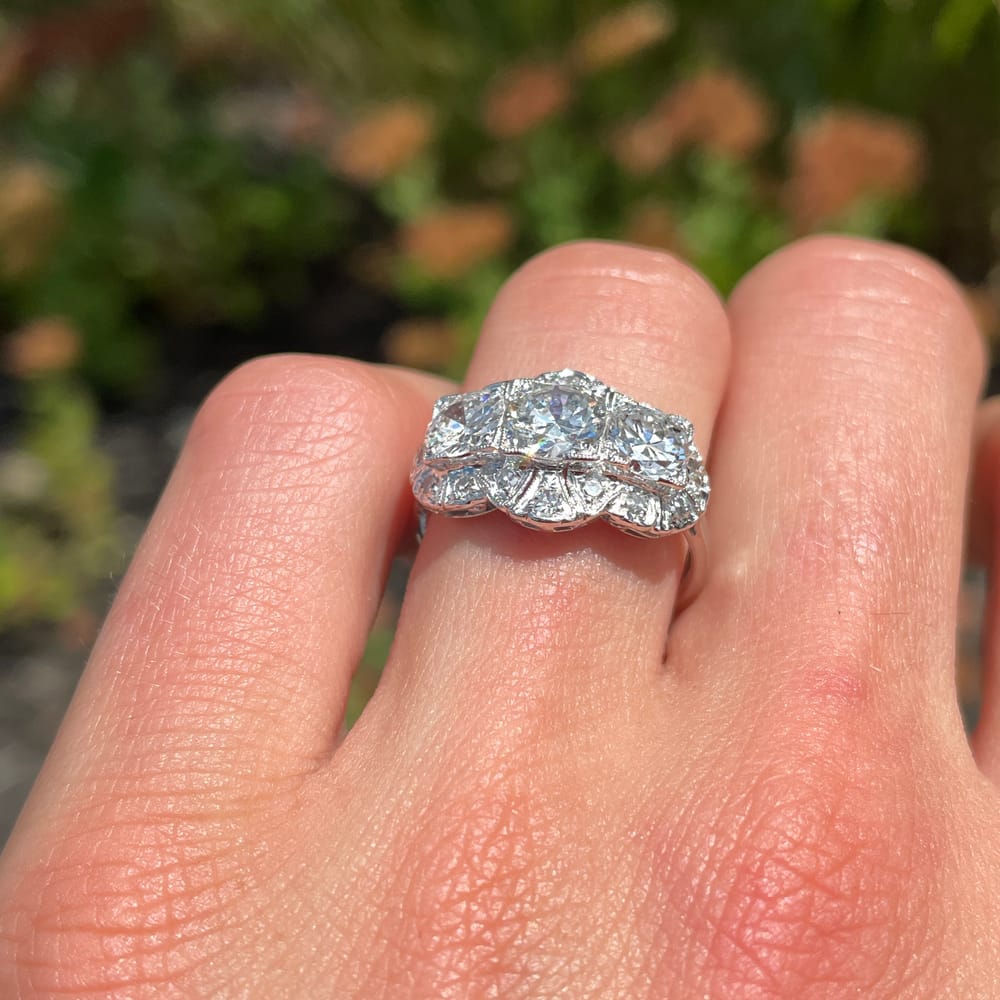 007-001817_1S4DCYIA3 Late Edwardian Platinum Three Stone 2.10 ctw Diamond Halo Ring