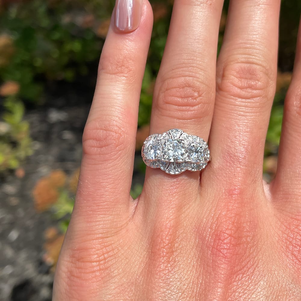 007-001817_1S4YNSIA3 Late Edwardian Platinum Three Stone 2.10 ctw Diamond Halo Ring